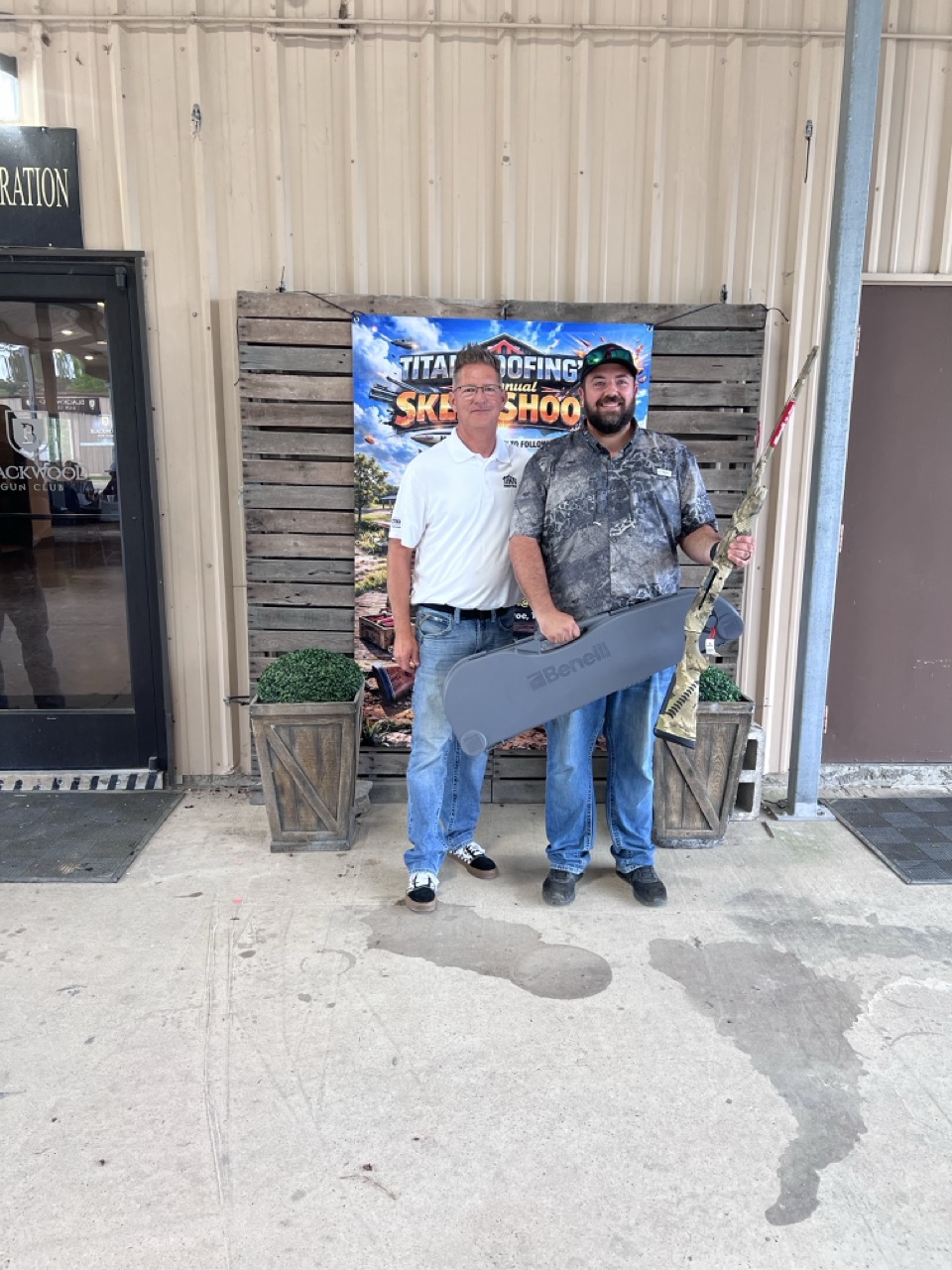 Levi Bradshaw holding Benelli 20 gauge shotgun top shooter 64 out of 72